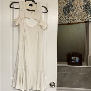 Cute fitted ribbed ivory dress with flutter bottom